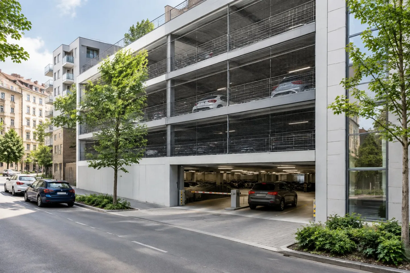 A multi-storey parking garage on an urban street in Budapest.
